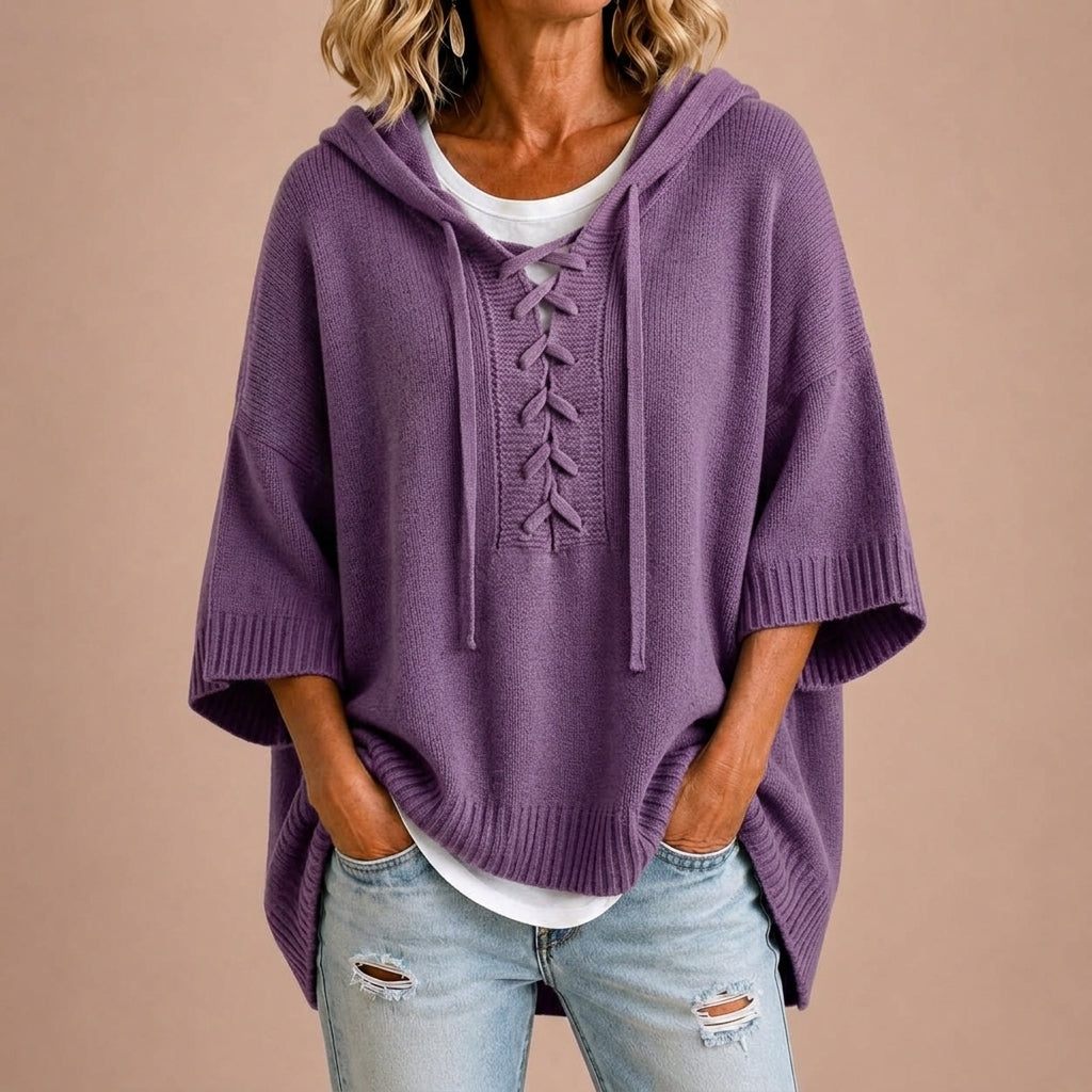 Gebreide poncho met capuchon