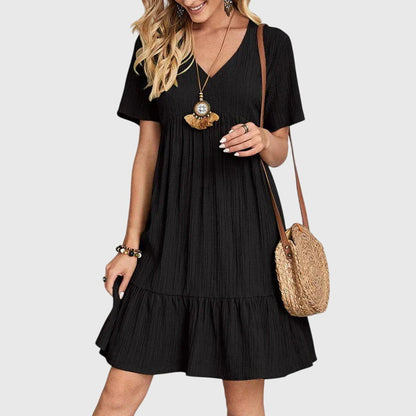 Korte jurk met geplooide taille