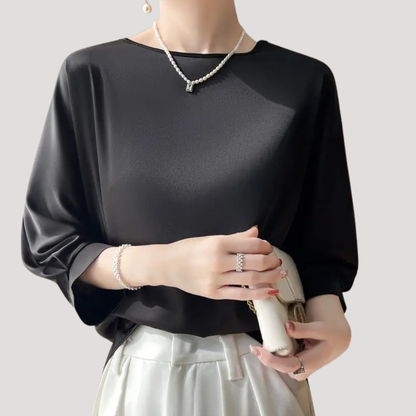Elegante blouse met ronde hals en driekwartmouwen