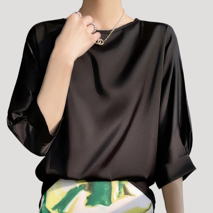 Elegante blouse met ronde hals en driekwartmouwen