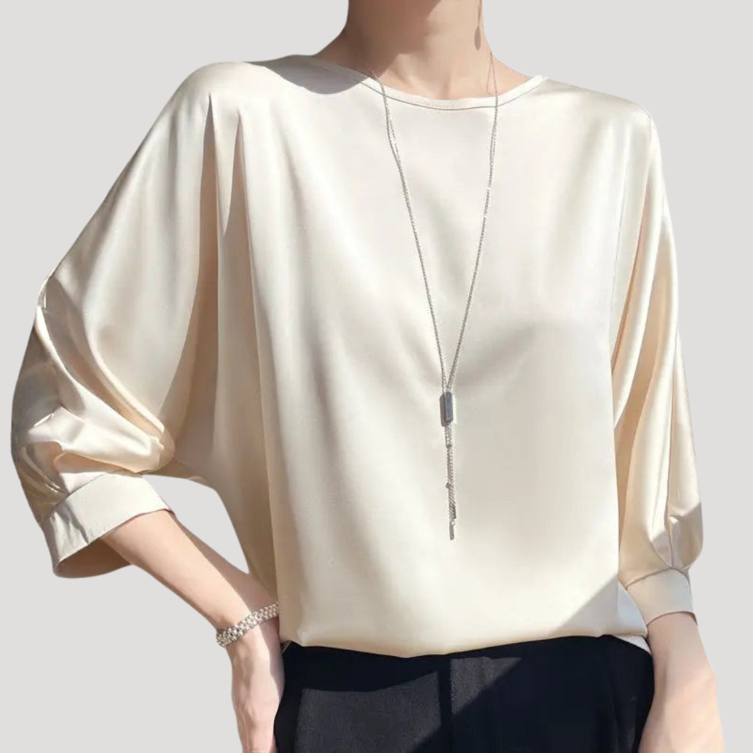 Elegante blouse met ronde hals en driekwartmouwen
