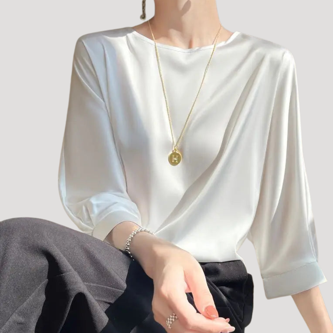 Elegante blouse met ronde hals en driekwartmouwen