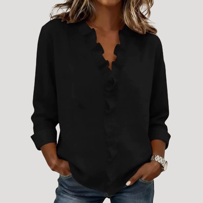 Elegante blouse met volants en V-hals