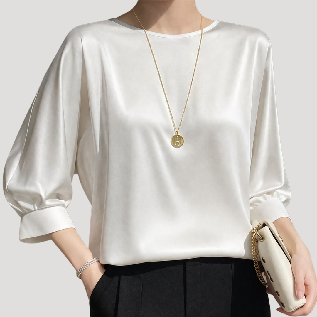 Elegante blouse met ronde hals en driekwartmouwen
