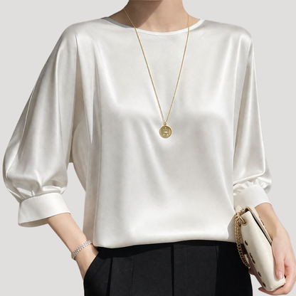 Elegante blouse met ronde hals en driekwartmouwen