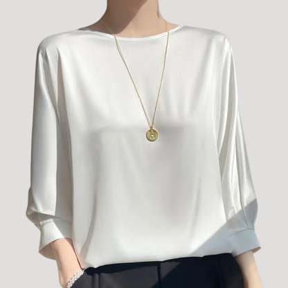 Elegante blouse met ronde hals en driekwartmouwen