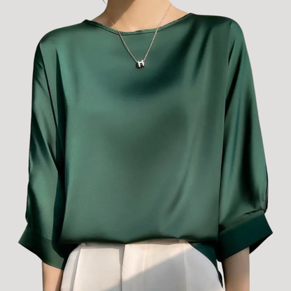Elegante blouse met ronde hals en driekwartmouwen