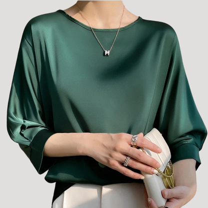 Elegante blouse met ronde hals en driekwartmouwen