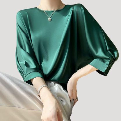 Elegante blouse met ronde hals en driekwartmouwen