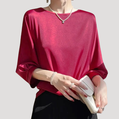 Elegante blouse met ronde hals en driekwartmouwen
