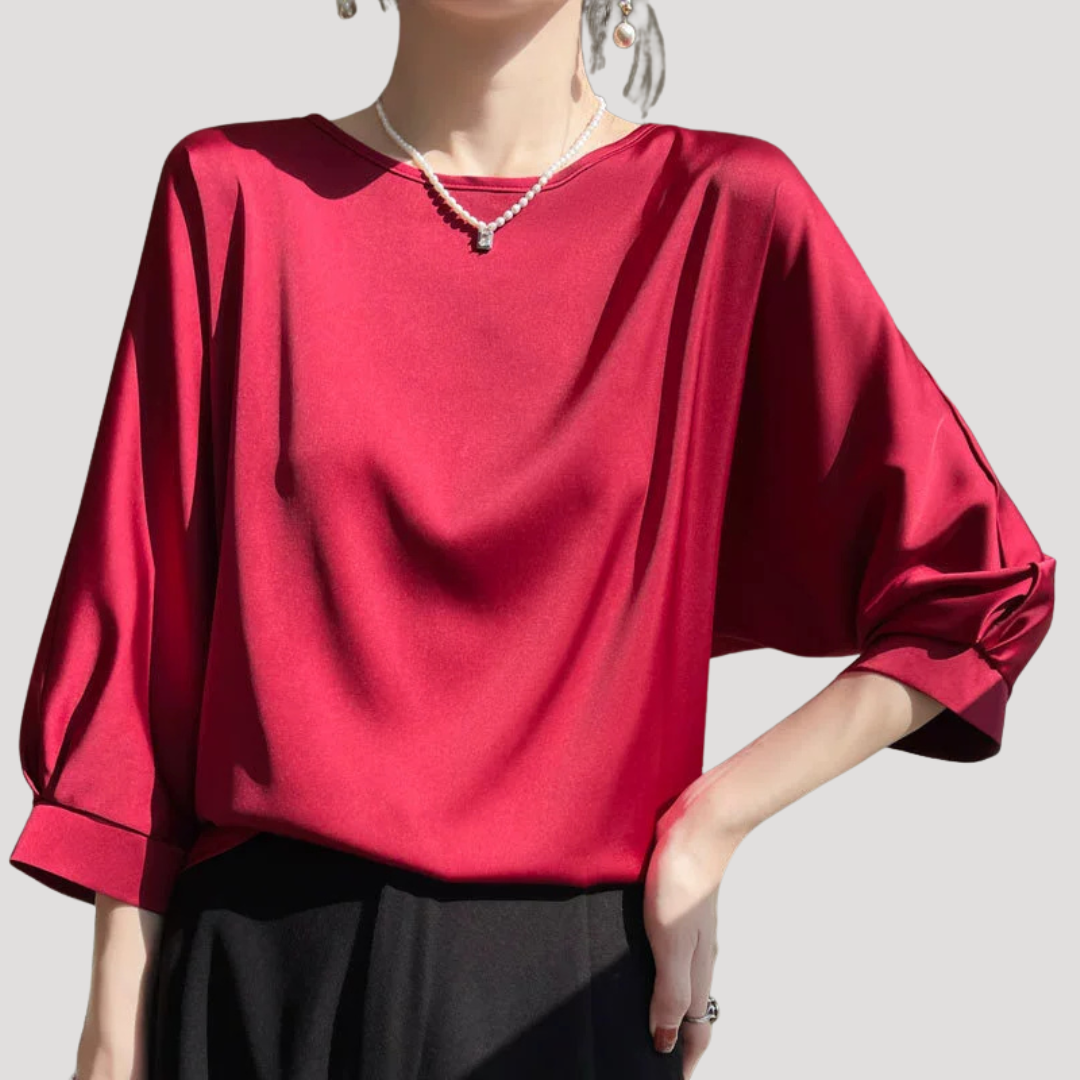 Elegante blouse met ronde hals en driekwartmouwen