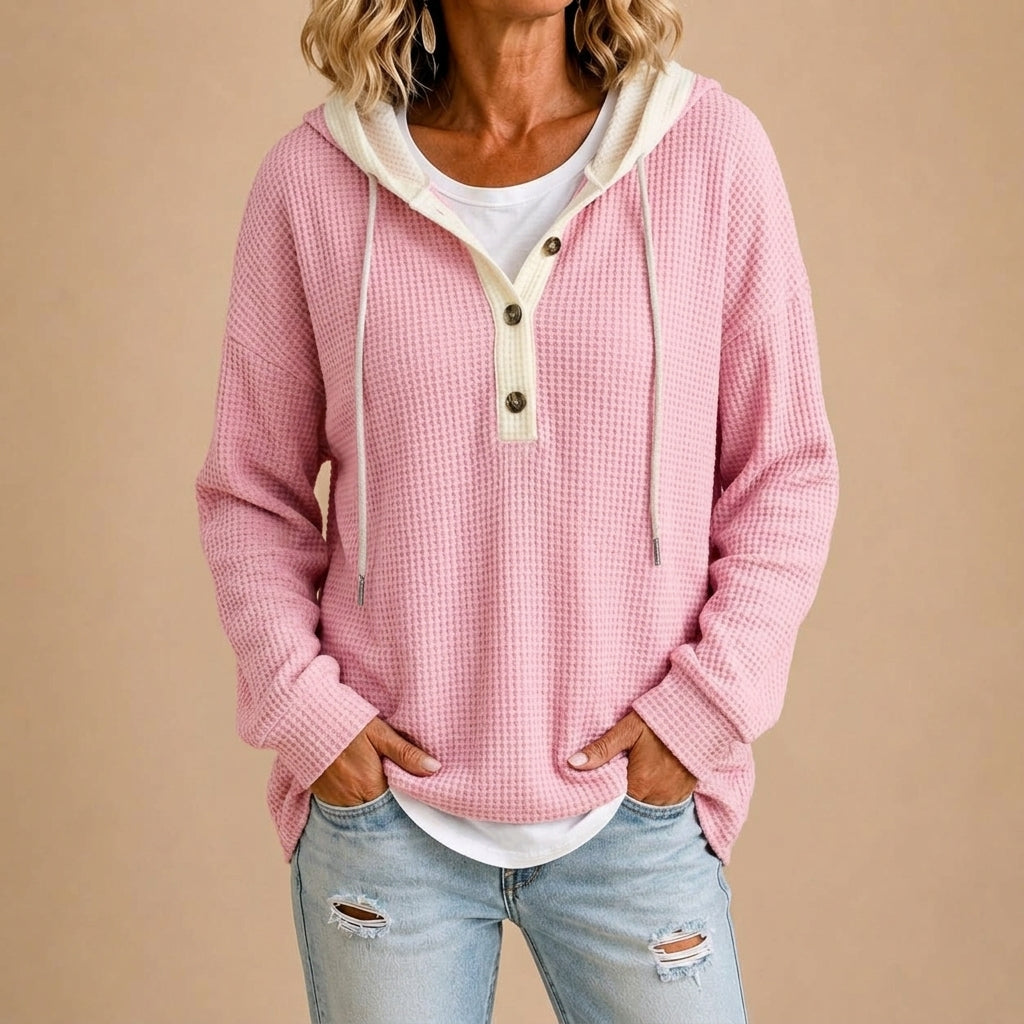 Gebreide poncho met capuchon en knopen