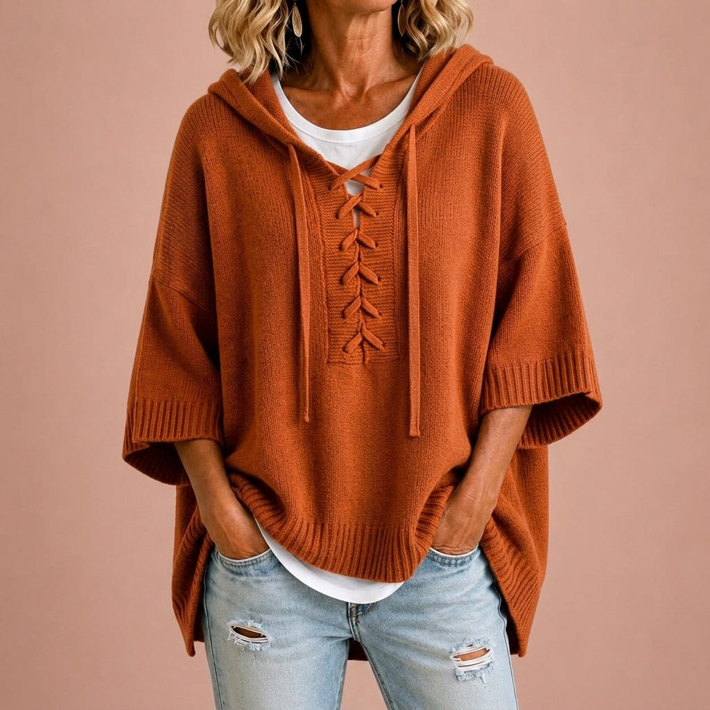 Gebreide poncho met capuchon