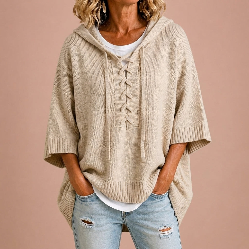 Gebreide poncho met capuchon