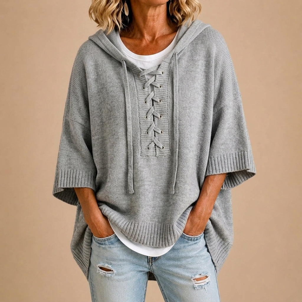 Gebreide poncho met capuchon