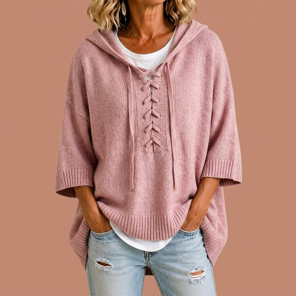 Gebreide poncho met capuchon