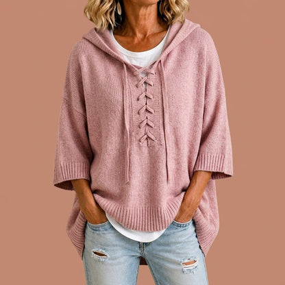 Gebreide poncho met capuchon