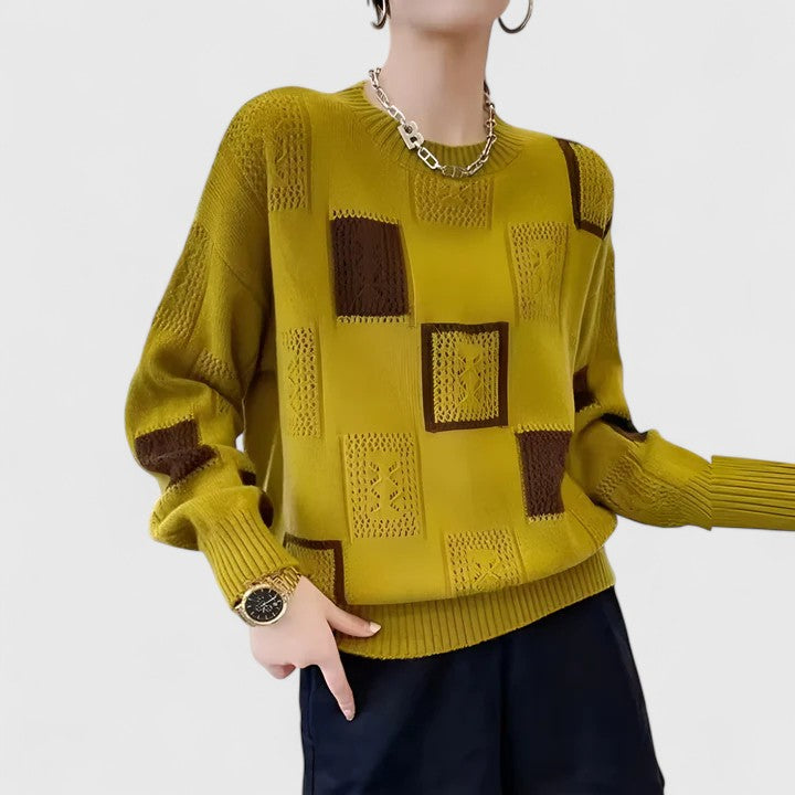 Trui met geometrische patchwork