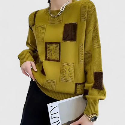 Trui met geometrische patchwork