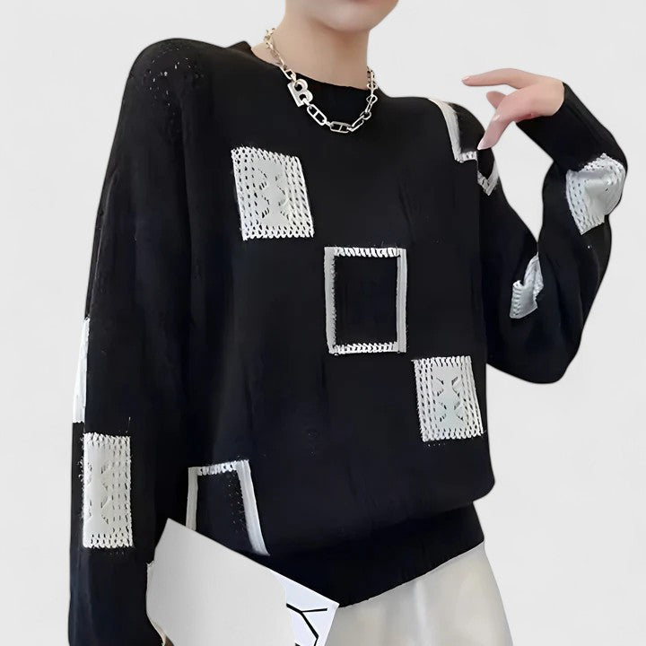 Trui met geometrische patchwork