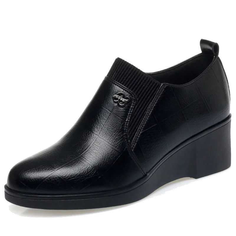 Pumps met sleehak en elastische instap
